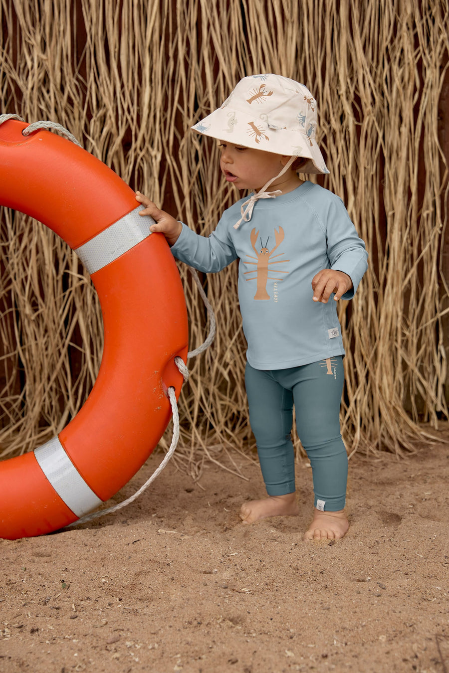 Children's reversible anti-UV hat Sea animals Off-white - Lassig 