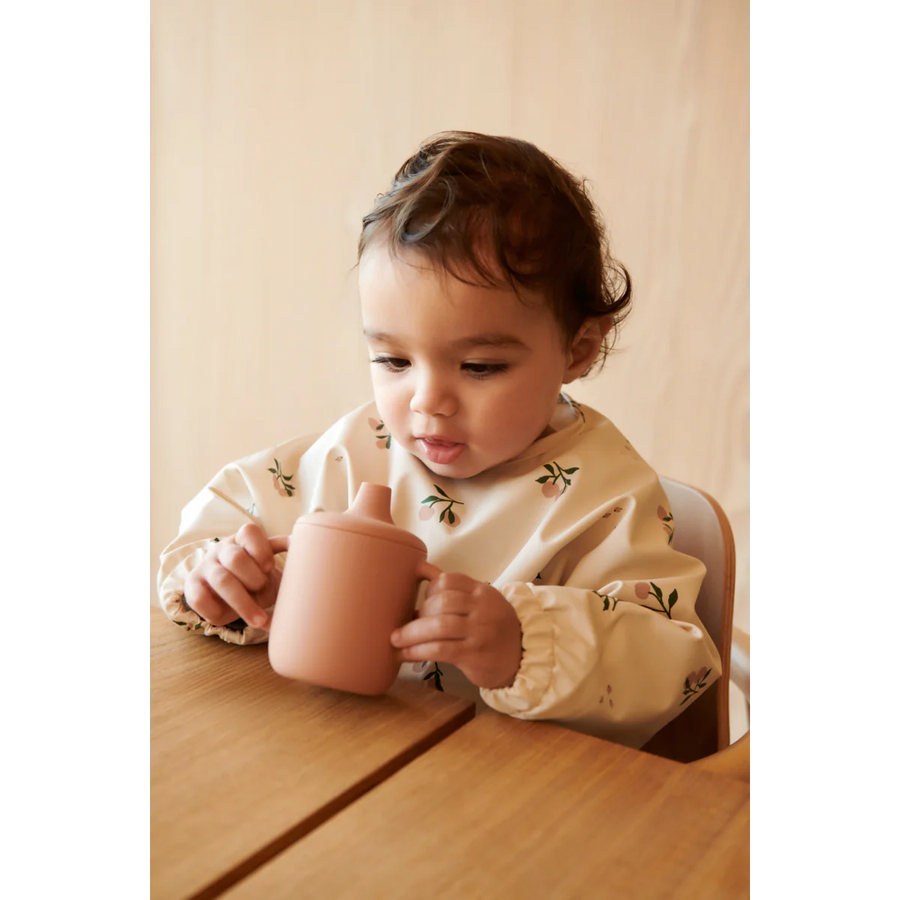 Merle Long Sleeve Bib | Peach/Sea shell mix - Liewood