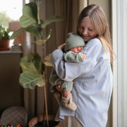 Licht mintgroene grofgebreide babytrui - Mushie 